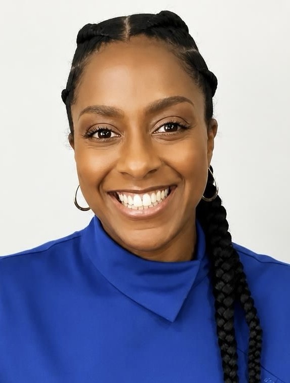 Deborah C. Mortimer, principal attorney at Mortimer Legal, smiling in a blue top